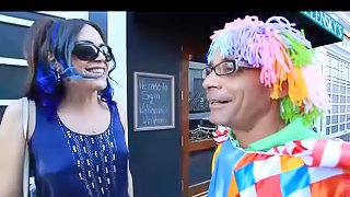 Beautiful tranny and a clown have anal sex in bed