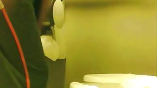Girl sat pissing on toilet and flashed the booty view